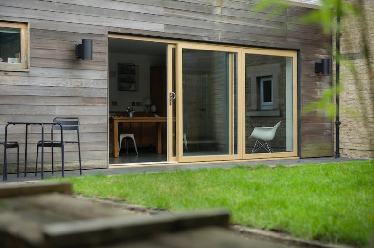 Double leafed sliding patio door