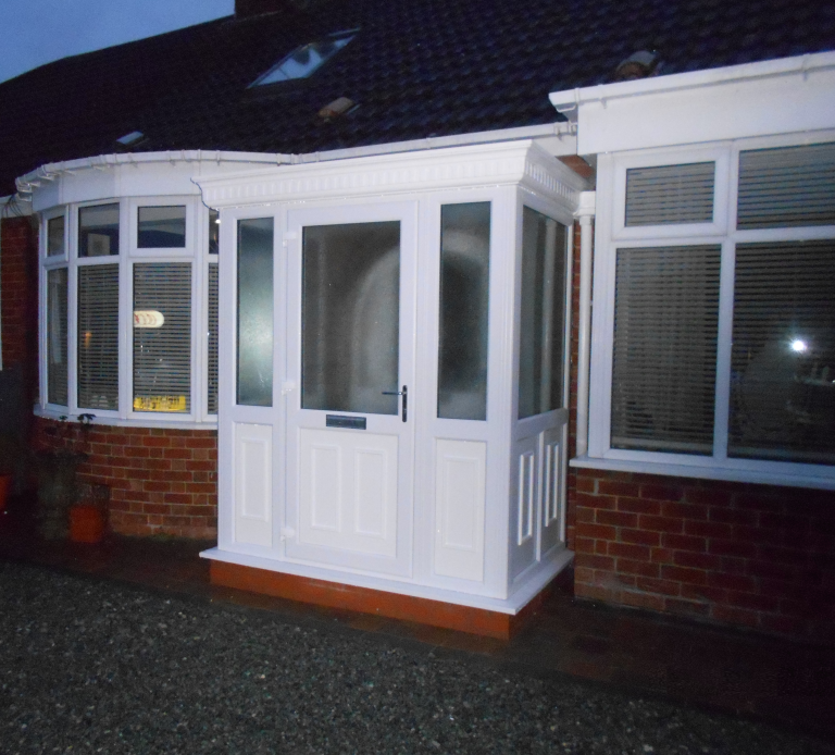 A PVC-u porch door in White